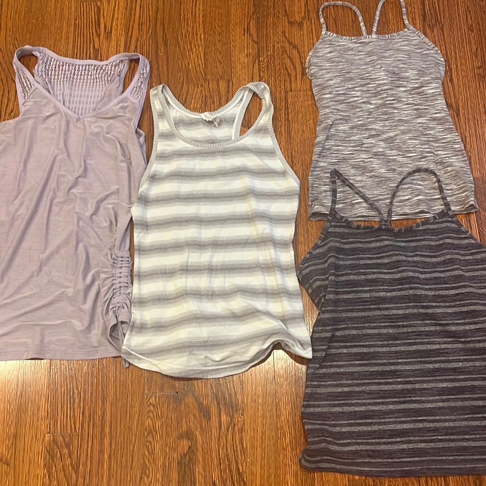 4 Lululemon workout tanks.